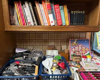 Tons of cookbooks and kitchen gadgets.