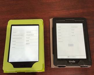 Two Kindle Ereaders Reset To Factory Settings With Cases