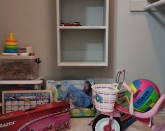 Kids playroom and Assortment of Kids toys, tricycle