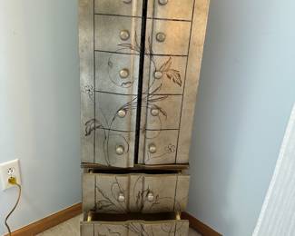 Decorative jewelry armoire - located in master bedroom
