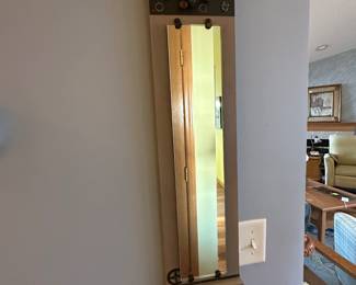 Wall mirror with buttons