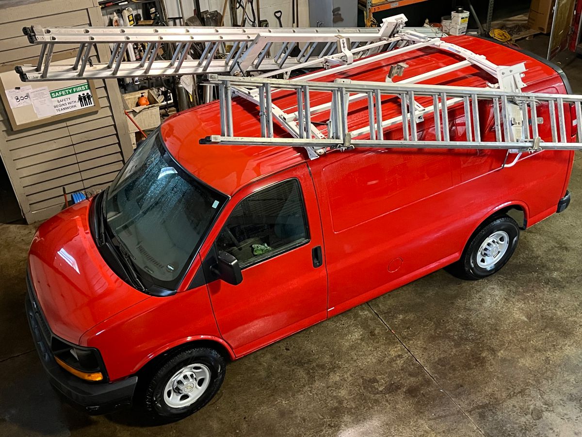 2007 Chevy 2500 express van with ladder rack and tool shelves