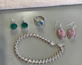 silver jewelry: earrings, bracelet, ring