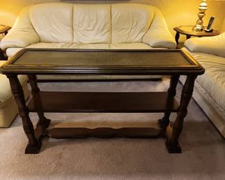 Caned top sofa table with 3 matching end tables.