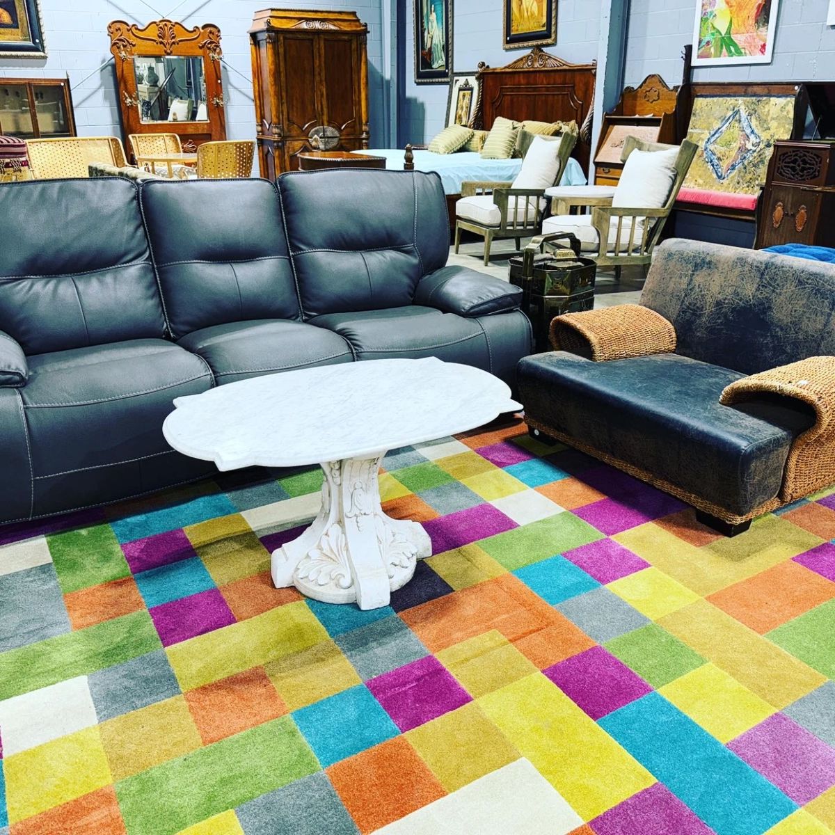 Abstract Rug, Leather Reclining Sofa and Oversized Chair Orlando Estate Auction