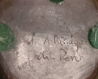 Signature on  pottery 