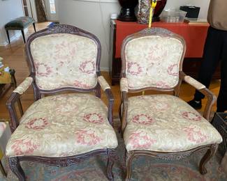 Pair of classic upholstered arm chairs