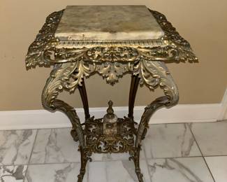 Ornate marble topped table