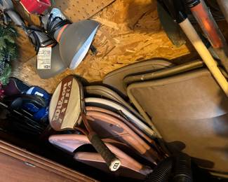 Folding chairs and golf clubs 