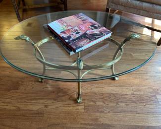 Brass and glass oval coffee table 34” x 25”