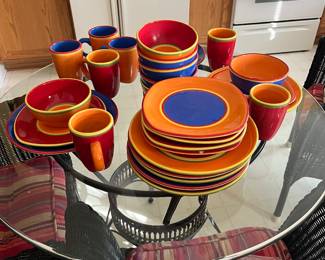 Set of every day dishes, bowls, mugs and salad plates