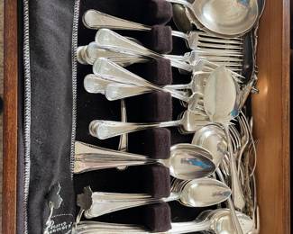 Silver plated silverware. Some of the serving pieces are marked sterling silver. 