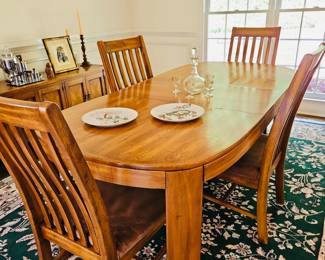 4 slat back dining chairs with oval dining table 