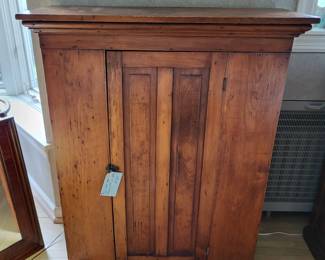 1 narrow door cabinet, front view, closed