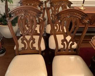 #61	AICO Oak Set of 6 Heavy Dining Chairs w/carved Backs and legs w/seats (still in plastic) 	 $300.00 
