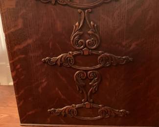 #60	Singer Sewing Cabinet  (no machine) w/6 drawers & Cast Iron Base w/side wood carved - 36x18x31  in great condition	 $100.00 
