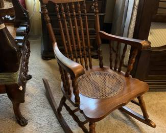 #86	Oak Rocking Chair w/Cane Seat & spindle Back	 $65.00 
