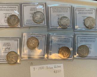 #275	8-1921 Silver Dollars	 $250.00 
