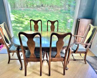 Ethan Allen dining table & chairs ca.1973 
Chairs have been re-covered
Comes with 2 leaves and pads