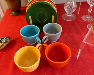 Fiesta ware cups and small plates