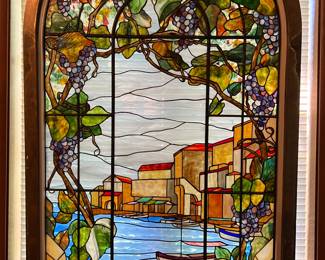 Large stained glass window with copper frame