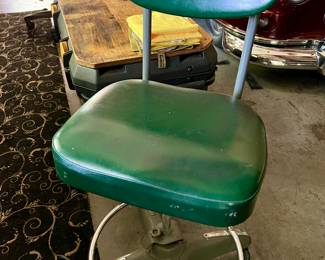 Green vinyl swivel chair