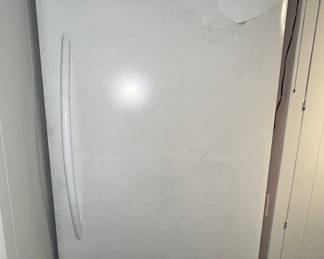 Large Frigidaire freezer (plastic cover on front still adhered)