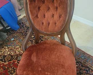 Antique chair with metal casters