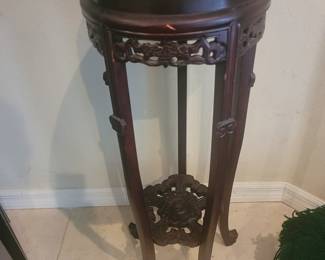 Another stand with a marble top, inlaid