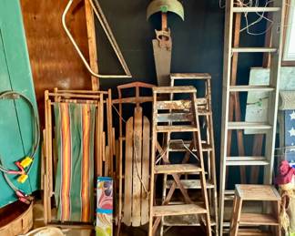 Wooden Ladders;  Aluminum Ladder;  Vintage Wooden Sled;  Vintage Wood & Canvas Chairs;  Saws