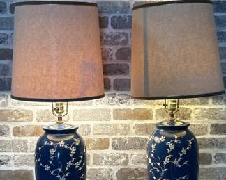 (2) Navy Lamps with White Ornamental Flower Detail