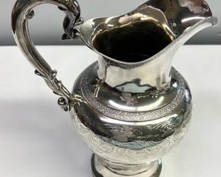 Extremely heavy sterling water pitcher 