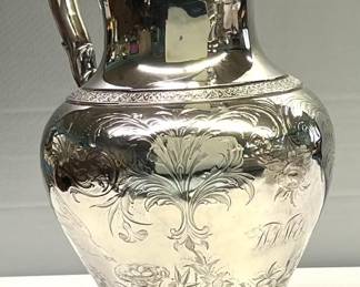 Front view of sterling water pitcher