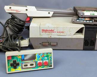 Nintendo Entertainment System, Model NES-001,With Light Gun, 2 Controllers, 3 Games Including Tecmo, Super Bowl, Super Mario Bros/Duck Hunt, And Goal