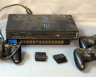 Sony PlayStation 2 With 4 Wireless Controllers, 2 Are Missing Receivers, 2 Wired Controllers, And 2 PlayStation 1 Controllers