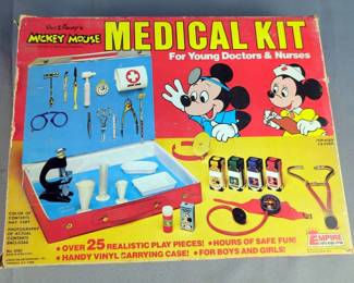 Walt Disney's Mickey Mouse Medical Kit, Dial Typewriter, And Spring Cleaning 7 Pc Cookware Playset, All In Original Boxes