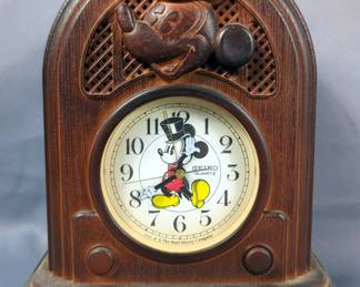 The Walt Disney Co. Seiko Quartz Hollywood Mickey 8.5" Alarm Clock, Mickey Unlimited Westclox Digital Am/Fm Clock Radio, Sunbeam Mickey Wall Clock, 11" Tall, And Hand Painted Clock, 13.5" Dia