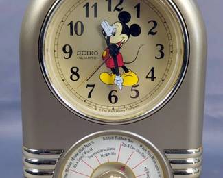 The Walt Disney Co. Seiko Quartz Mickey Mouse Battery Operated Musical Alarm Clock, Plays The Mickey Mouse Club March, It's A Small World, Heigh-Ho And More, 7" Tall