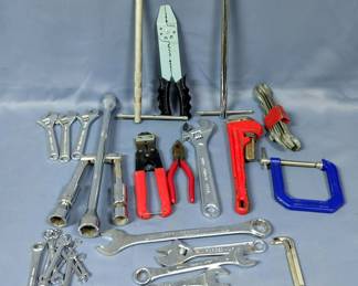 Hand Tool Assortment Including 10" Pipe Wrench, Combination Wrenches, Collapsible Tire Iron, And More