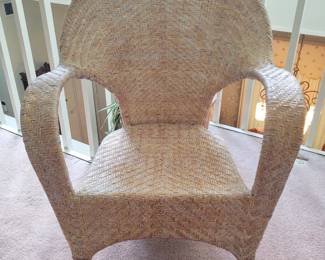Woven wicker and reed armchair