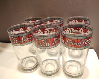 Collectible Coca-Cola glassware set.