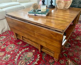 unique large coffee table with drop leaf sides.