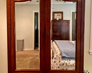 large mirrored armoire