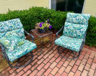pair of swivel patio chairs