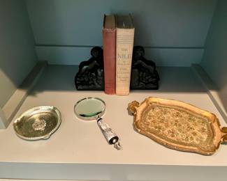 Florentine tray, magnifying glass with bone handle, pair of cherub bookends