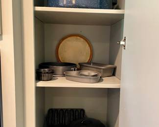 enameled roaster, pampered chef round tray, cake pans, cast iron (cornbread pan, fryer, skillet, and cornstick pan)
