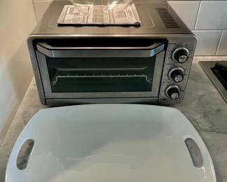 large white serving tray, glass coffee pot, Cuisinart toaster oven