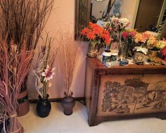 Variety of "flower" arrangements and  home decor items..