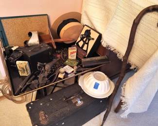 Antique Ice cane, suitcase, hat, Phillips pills, and little liver pills, and retro Tupperware. 