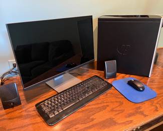 Dell monitor, computer keyboard, mouse, speakers and tower